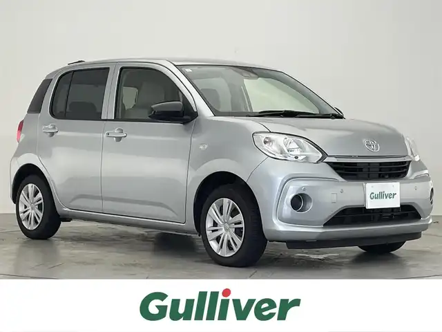 トヨタ パッソ X 滋賀県 2021(令3)年 1.9万km ブライトシルバーM 社外7型ナビ/【CD/DVD/SD/Bluetooth/USB/フルセグ】/バックカメラ/オートマチックハイビーム/衝突軽減ブレーキ/コーナーセンサー/ビルトインETC/電動格納ミラー/プッシュスタート/スマートキー/ステアリングリモコン