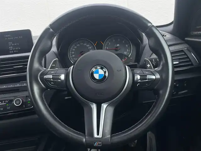ＢＭＷ Ｍ２ 東京都 2016(平28)年 5.7万km ロングビーチブルーメタリック ハーマンカードンサウンド/サンルーフ/クルーズコントロール/レーザーシート/シートヒーター/純正ナビ/前後ドライブレコーダー/パドルシフト/カーボンミラーカバー/インテリジェントセーフティ