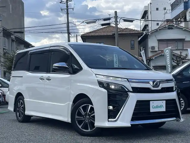 トヨタ ヴォクシー ZS 煌 兵庫県 2018(平30)年 6.3万km ホワイトパールクリスタルシャイン ・ワンオーナー/・アルパイン9インチナビ（X9Z）//地デジ/DVD/BT/USB/HDMI/・バックカメラ/・ステアリングリモコン/・両側パワースライドドア/・ビルトインETC/・アイドリングストップ/・オートLEDヘッドランプ/・LEDフォグランプ/・純正16インチAW/・プリクラッシュセーフティ/・レーンディーパーチャーアラート/・オートマチックハイビーム/・R1-6年ディーラー点検記録簿/・取説/保証書/ナビ説/スペアキー後送