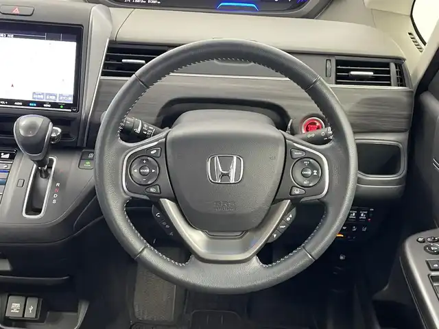 ホンダ フリード G ホンダセンシング 埼玉県 2022(令4)年 1.4万km クリスタルブラックパール 純正９インチナビ　バックカメラ　ビルトインＥＴＣ２．０　ホンダセンシング　アダクティブクルーズコントロール　シートヒーター　ＨＤＭＩ　スマートキー　オートライト　ＬＥＤヘッドライト　地デジフルセグ