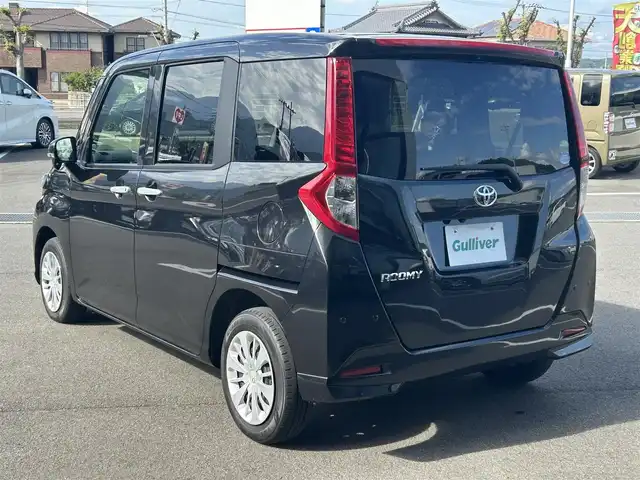 トヨタ ルーミー G－T 愛媛県 2020(令2)年 2.6万km ブラックマイカメタリック 純正9型ナビ/純正12.1型フリップダウンモニター/両側パワースライドドア/純正ドライブレコーダー/バックカメラ/クルーズコントロール/アイドリングストップ/衝突被害軽減装置/車線逸脱防止装置/クリアランスソナー/ステアリングリモコン/後席サンシェイド/電動格納ミラー/ヘッドライトレベライザー/シガーソケット/純正ホイールキャップ/現状サマー(鉄)(165/65/R14)/DUNLOP ENASAVE EC300+/禁煙車