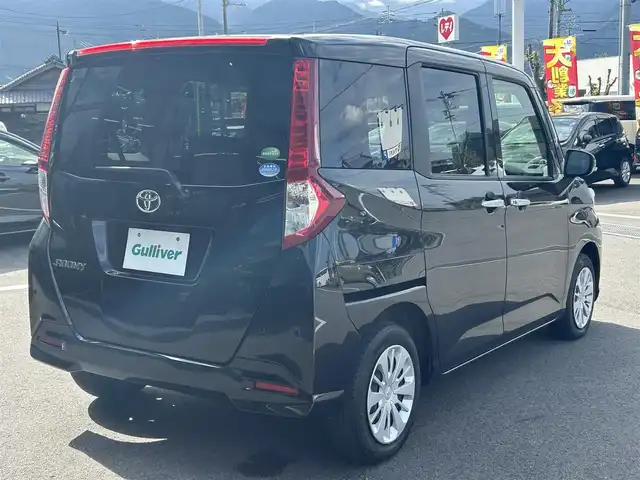 トヨタ ルーミー G－T 愛媛県 2020(令2)年 2.6万km ブラックマイカメタリック 純正9型ナビ/純正12.1型フリップダウンモニター/両側パワースライドドア/純正ドライブレコーダー/バックカメラ/クルーズコントロール/アイドリングストップ/衝突被害軽減装置/車線逸脱防止装置/クリアランスソナー/ステアリングリモコン/後席サンシェイド/電動格納ミラー/ヘッドライトレベライザー/シガーソケット/純正ホイールキャップ/現状サマー(鉄)(165/65/R14)/DUNLOP ENASAVE EC300+/禁煙車