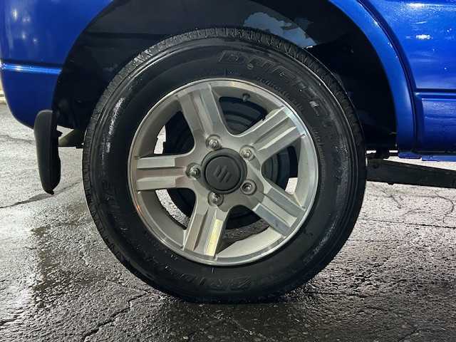 スズキ ジムニー XC 道東・釧路十勝 2008(平20)年 6.9万km パールメタリックカシミールブルー 社外CD/USB/AUX/ミラーヒーター/バイザー/キーレス/ライトレベライザー/純正フォグランプ/電格ミラー/社外アルミ付冬タイヤ積込