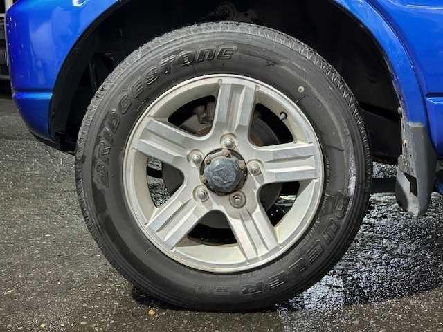 スズキ ジムニー XC 道東・釧路十勝 2008(平20)年 6.9万km パールメタリックカシミールブルー 社外CD/USB/AUX/ミラーヒーター/バイザー/キーレス/ライトレベライザー/純正フォグランプ/電格ミラー/社外アルミ付冬タイヤ積込