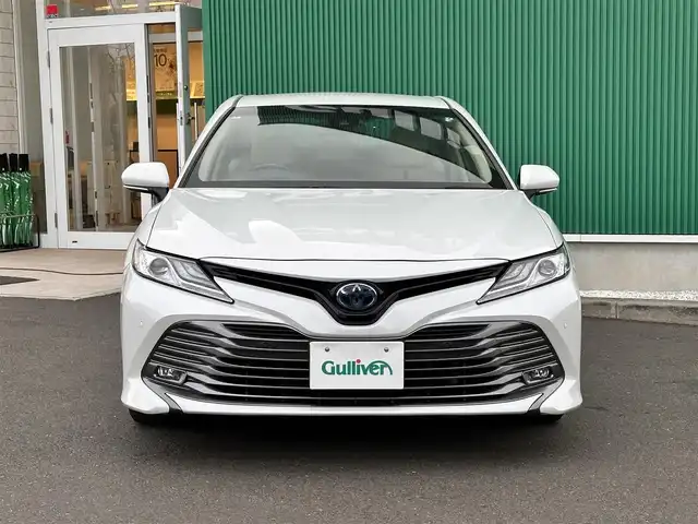 トヨタ カムリ G レザーパッケージ 宮城県 2019(令1)年 6.2万km プラチナホワイトパールマイカ ブラインドスポットモニター/リアクロストラフィックオートブレーキ/＝＝＝/セーフティセンス/・プリクラッシュセーフティ/・レーンディパーチャーアラート/・オートマチックハイビーム/・レーダークルーズコントロール/インテリジェントクリアランスソナー/TコネクトSDナビゲーション/・8インチワイドディスプレイ/・地デジTV/・CD/DVD/・Blu-ray/・Bluetooth/・USB/AUX端子/・バックカメラ/ビルトインETC2.0/カラーヘッドアップディスプレイ/本革シート/パワーシート/シートヒーター/革巻きステアリング/電動パーキングブレーキ/ブレーキホールド/LEDヘッドランプ/フォグランプ/オートライト/スマートキー＆プッシュスタート/電動格納ミラー/純正18インチAW/純正フロアマット/純正ドアバイザー/W/サイド/カーテンエアバッグ