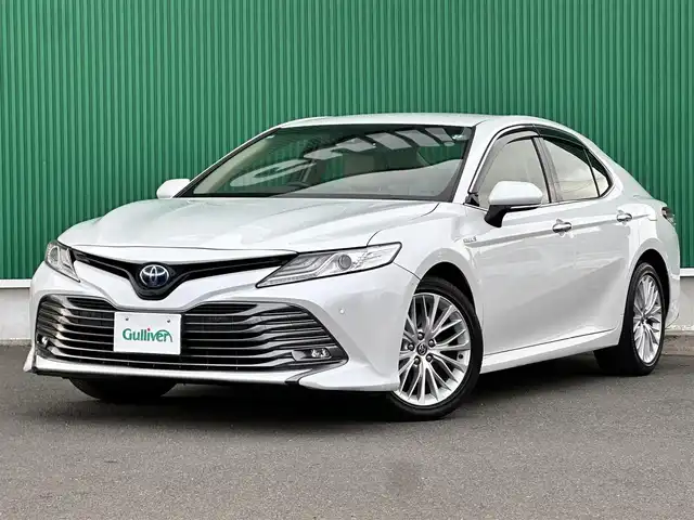 トヨタ カムリ G レザーパッケージ 宮城県 2019(令1)年 6.2万km プラチナホワイトパールマイカ ブラインドスポットモニター/リアクロストラフィックオートブレーキ/＝＝＝/セーフティセンス/・プリクラッシュセーフティ/・レーンディパーチャーアラート/・オートマチックハイビーム/・レーダークルーズコントロール/インテリジェントクリアランスソナー/TコネクトSDナビゲーション/・8インチワイドディスプレイ/・地デジTV/・CD/DVD/・Blu-ray/・Bluetooth/・USB/AUX端子/・バックカメラ/ビルトインETC2.0/カラーヘッドアップディスプレイ/本革シート/パワーシート/シートヒーター/革巻きステアリング/電動パーキングブレーキ/ブレーキホールド/LEDヘッドランプ/フォグランプ/オートライト/スマートキー＆プッシュスタート/電動格納ミラー/純正18インチAW/純正フロアマット/純正ドアバイザー/W/サイド/カーテンエアバッグ