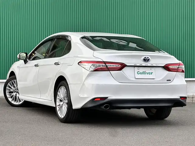 トヨタ カムリ G レザーパッケージ 宮城県 2019(令1)年 6.2万km プラチナホワイトパールマイカ ブラインドスポットモニター/リアクロストラフィックオートブレーキ/＝＝＝/セーフティセンス/・プリクラッシュセーフティ/・レーンディパーチャーアラート/・オートマチックハイビーム/・レーダークルーズコントロール/インテリジェントクリアランスソナー/TコネクトSDナビゲーション/・8インチワイドディスプレイ/・地デジTV/・CD/DVD/・Blu-ray/・Bluetooth/・USB/AUX端子/・バックカメラ/ビルトインETC2.0/カラーヘッドアップディスプレイ/本革シート/パワーシート/シートヒーター/革巻きステアリング/電動パーキングブレーキ/ブレーキホールド/LEDヘッドランプ/フォグランプ/オートライト/スマートキー＆プッシュスタート/電動格納ミラー/純正18インチAW/純正フロアマット/純正ドアバイザー/W/サイド/カーテンエアバッグ