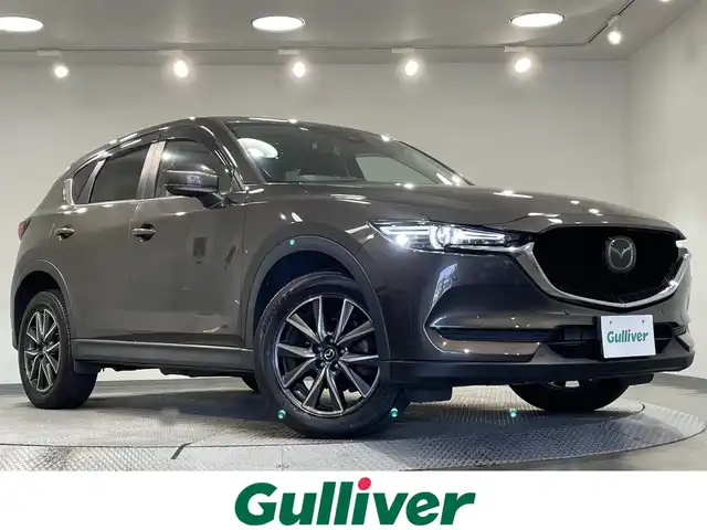 マツダ ＣＸ－５ 20S プロアクティブ 愛知県 2017(平29)年 2.4万km チタニウムフラッシュマイカ 純正ナビ（AM/FM/CD/DVD/BT/USB/ワンセグ）/バックカメラ/ETC/ブラインドスポットモニター/ヘッドアップディスプレイ/衝突被害軽減システム/レーダークルーズコントロール/レーンキープアシスト/コーナーセンサー/横滑り防止装置/アイドリングストップ/オートホールド付電子パーキング/純正アルミホイール/純正フロアマット/オートLEDライト/オートマチックハイビーム/革巻きステアリング/ステアリングスイッチ/スマートキー