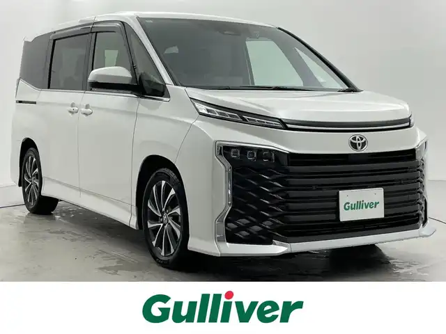 トヨタ ヴォクシー S－Z 福井県 2024(令6)年 0.6万km ホワイトパールクリスタルシャイン 純正ディスプレイオーディオ　/純正フリップダウンモニター/両側パワースライドドア /電動リアゲート/CD DVD BT フルセグTV /スマートフォン連携　HDMI USB /バックカメラ　/アダプティブクルーズコントロール　/トヨタセーフティーセンス　/デジタルインナーミラー /HUD/前後ドライブレコーダー/ステアリングヒーター