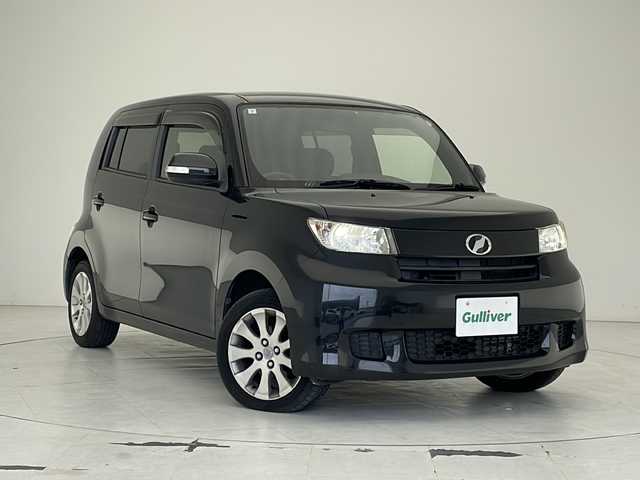 トヨタ ｂＢ Z 沖縄県 2015(平27)年 5.9万km ブラックマイカメタリック 純正ナビ(NSZT-W64)/（フルセグＴＶ　ＣＤ　Ｂｌｕｅｔｏｏｔｈ接続）/バックカメラ/ビルトインＥＴＣ/バックカメラ/横滑り防止装置/オートエアコン/電動格納ウインカーミラー/純正１５インチアルミホイール/パワーステアリング/ドアバイザー