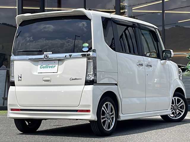 ホンダ Ｎ ＢＯＸ カスタム G Lパッケージ 大阪府 2016(平28)年 6万km プレミアムホワイトパールⅡ Ｇａｔｈｅｒｓインターナビ　フルセグＴＶ　ＤＶＤ　ＣＤ　ＢＴ　バックカメラ　後席Ｇａｔｈｅｒｓフリップダウンモニター　パワースライドドア　ディスチャージヘッドライト　リア席サンシェード　ETC　禁煙車　シートバックテーブル　スマートキー　純正フロアマット　オートライト