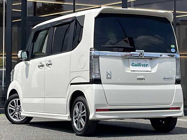 ホンダ Ｎ ＢＯＸ カスタム G Lパッケージ 大阪府 2016(平28)年 6万km プレミアムホワイトパールⅡ Ｇａｔｈｅｒｓインターナビ　フルセグＴＶ　ＤＶＤ　ＣＤ　ＢＴ　バックカメラ　後席Ｇａｔｈｅｒｓフリップダウンモニター　パワースライドドア　ディスチャージヘッドライト　リア席サンシェード　ETC　禁煙車　シートバックテーブル　スマートキー　純正フロアマット　オートライト
