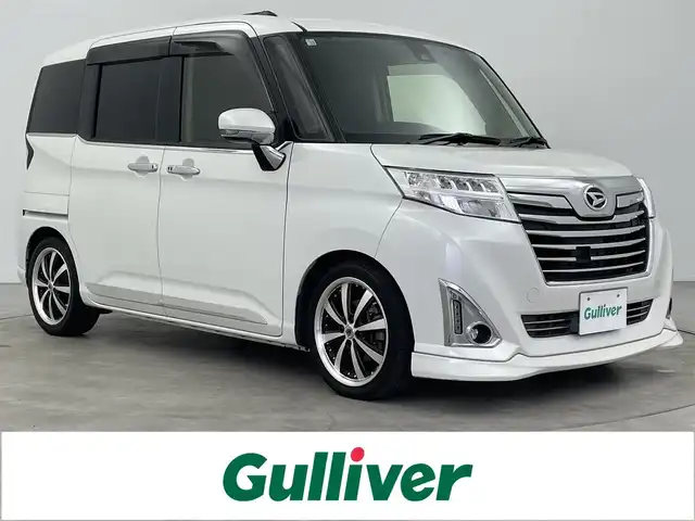 ダイハツ トール カスタムG ターボ SAⅡ 大分県 2018(平30)年 3.8万km パールホワイトⅢ スマートアシスト2/・衝突警報機能/・衝突回避支援ブレーキ機能/作動車速50km/h以下対象車両のみ/・車線逸脱警報機能	/・誤発進抑制機能(前方)/・誤発進抑制機能(後方)/・先行車発進お知らせ機能/社外9型ナビ　型式：X9VD/【フルセグTV、DVD再生可、BT対応】/ステアリングスイッチ/バックカメラ/クルーズコントロール/両側電動スライドドア/ETC/前方ドライブレコーダー/オートライト/LEDヘッドライト/LEDフォグ/社外16インチアルミホイール/純正ＡＷ夏タイヤ積み込み/保証書、取説、スペアキー有り