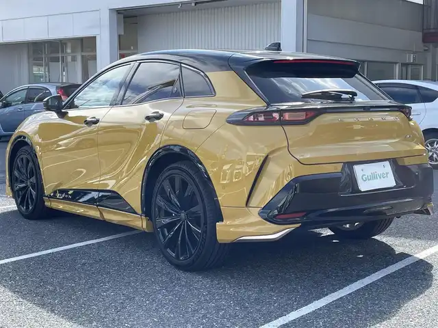 トヨタ クラウン スポーツ Z 千葉県 2024(令6)年 0.1万km 黄 ワンオーナー/純正ナビ【フルセグ、Miracast】/純正21インチアルミホイール/モデリスタエアロ（フロント・サイド・リア）/全方位カメラ/バックカメラ/ビルトインETC2.0/前後コーナーセンサー/前席パワーシート（D席メモリー付）/前席シートヒーター・ベンチレーション/パワーバックドア/PCS/BSM/HUD/LDA/PCS/PDA/RCTA/RCD/PKSB/SEA/AVSP/RSA/タイプC充電/4WD　　　/オートライト/オートハイビーム/保証書