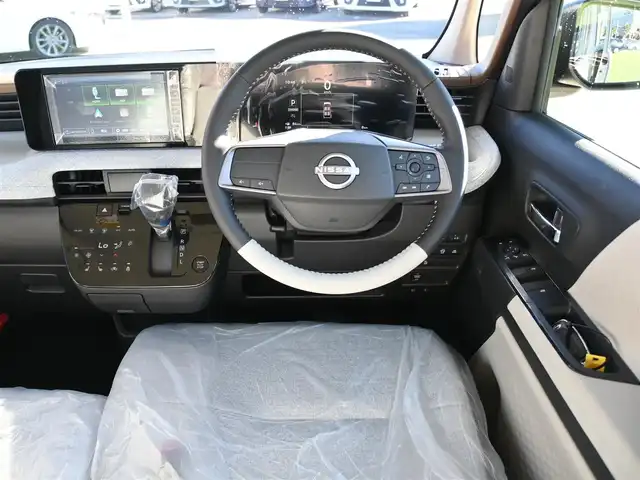 日産 ルークス ハイウェイスター X 千葉県 2025(令7)年 0.1千km パールⅡ ハイウェイスターX　9インチディスプレイオーディオDJ1（137/500）バックビューモニター（32780）/エマージェンシーブレーキ/アイドリングストップ/両側パワースライドドア/ディスプレイオーディオ/【Apple CarPlay　Android Auto対応】/【Bluetooth接続】/バックカメラ/前席シートヒーター/革巻きステアリング/ステアリングヒーター/ステアリングスイッチ/LEDヘッドライト/フォグライト/ウインカーミラー/コーナーセンサー/純正14インチアルミホイル/サイド/カーテンエアバッグ/インテリジェントキー