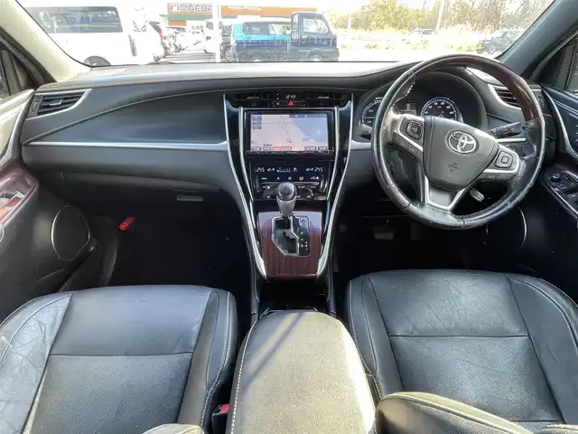 トヨタ ハリアー ハイブリッド プレミアム 青森県 2015(平27)年 12.6万km ブラッキッシュアゲハガラスフレーク ４WD/社外HDDナビ/（BT／AM／FM／DVD）/バックカメラ/パワーバックドア/黒革シート/シートメモリー（運転席）/パワーシート（運転席＋助手席）/シートヒーター（運転席＋助手席）/ステアリングスイッチ/クルーズコントロール/LEDヘッドライト/オートマチックハイビーム/ビルトインETC/スペアキー/保証書/取り扱い説明書