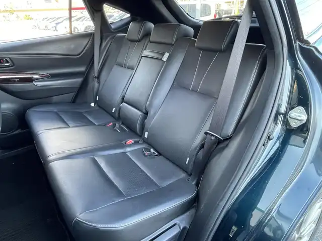 トヨタ ハリアー ハイブリッド プレミアム 青森県 2015(平27)年 12.6万km ブラッキッシュアゲハガラスフレーク ４WD/社外HDDナビ/（BT／AM／FM／DVD）/バックカメラ/パワーバックドア/黒革シート/シートメモリー（運転席）/パワーシート（運転席＋助手席）/シートヒーター（運転席＋助手席）/ステアリングスイッチ/クルーズコントロール/LEDヘッドライト/オートマチックハイビーム/ビルトインETC/スペアキー/保証書/取り扱い説明書