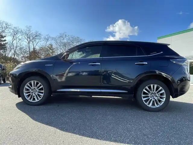 トヨタ ハリアー ハイブリッド プレミアム 青森県 2015(平27)年 12.6万km ブラッキッシュアゲハガラスフレーク ４WD/社外HDDナビ/（BT／AM／FM／DVD）/バックカメラ/パワーバックドア/黒革シート/シートメモリー（運転席）/パワーシート（運転席＋助手席）/シートヒーター（運転席＋助手席）/ステアリングスイッチ/クルーズコントロール/LEDヘッドライト/オートマチックハイビーム/ビルトインETC/スペアキー/保証書/取り扱い説明書