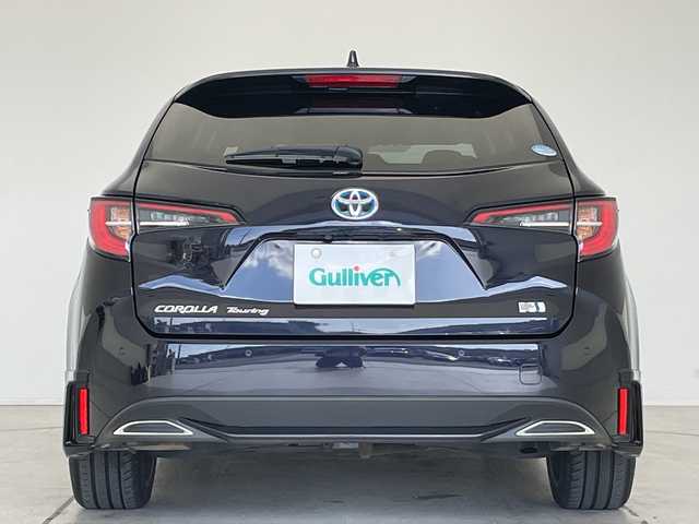 トヨタ カローラツーリング ハイブリッド ダブルバイビー 愛知県 2019(令1)年 2.2万km スパークリングブラックパールクリスタルシャイン モデリスタエアロ/純正9型ディスプレイオーディオナビ/レーダークルーズコントロール/シートヒーター/バックカメラ/コーナーセンサー/純正アルミホイール/ステアリングヒーター/LEDヘッドライト/オートマチックハイビーム/ドライブレコーダー/ETC/衝突軽減システム/フルセグ/Bluetooth/ステアリングスイッチ/スマートキー/プッシュスタート