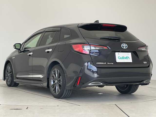 トヨタ カローラツーリング ハイブリッド ダブルバイビー 愛知県 2019(令1)年 2.2万km スパークリングブラックパールクリスタルシャイン モデリスタエアロ/純正9型ディスプレイオーディオナビ/レーダークルーズコントロール/シートヒーター/バックカメラ/コーナーセンサー/純正アルミホイール/ステアリングヒーター/LEDヘッドライト/オートマチックハイビーム/ドライブレコーダー/ETC/衝突軽減システム/フルセグ/Bluetooth/ステアリングスイッチ/スマートキー/プッシュスタート