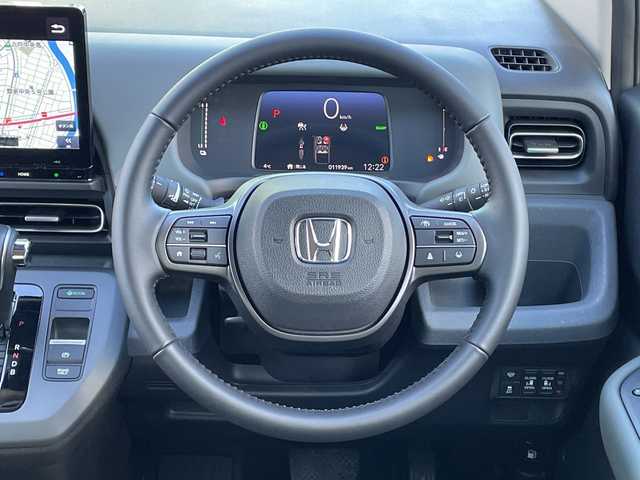 ホンダ フリード ハイブリット e:HEV クロスター 青森県 2025(令7)年 1.2万km トワイライトミストブラックパール 4WD/寒冷地仕様/純正11.4インチメモリナビ・フルセグTV/CD・DVD・Bluetooth・USB・SD/バックカメラ/合皮コンビシート/前席シートヒーター/両側パワースライドドア/ホンダセンシング/衝突軽減ブレーキ/前後誤発進抑制機能/追従クルーズコントロール/路外逸脱抑制機能/ブラインドスポットインフォメーション/オートハイビーム/純正ルーフラック/ワイパーデアイサー/LEDヘッドライト/オートライト/LEDフォグランプ/純正15インチアルミ