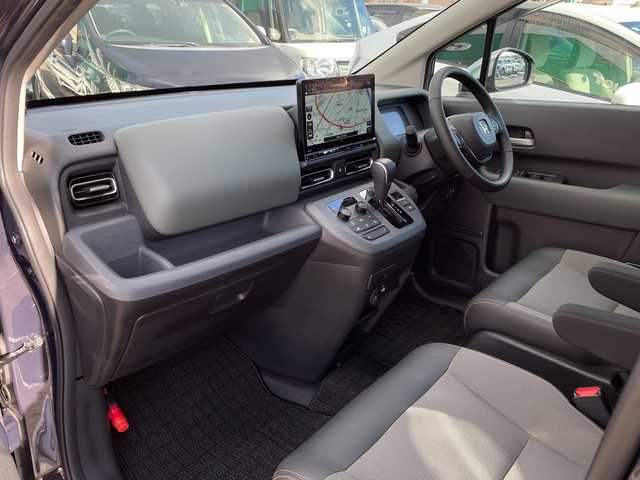 ホンダ フリード ハイブリット e:HEV クロスター 青森県 2025(令7)年 1.2万km トワイライトミストブラックパール 4WD/寒冷地仕様/純正11.4インチメモリナビ・フルセグTV/CD・DVD・Bluetooth・USB・SD/バックカメラ/合皮コンビシート/前席シートヒーター/両側パワースライドドア/ホンダセンシング/衝突軽減ブレーキ/前後誤発進抑制機能/追従クルーズコントロール/路外逸脱抑制機能/ブラインドスポットインフォメーション/オートハイビーム/純正ルーフラック/ワイパーデアイサー/LEDヘッドライト/オートライト/LEDフォグランプ/純正15インチアルミ