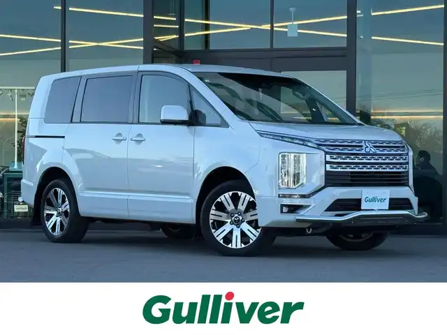 三菱 デリカＤ：５ G パワーパッケージ 東京都 2021(令3)年 4.1万km ウォームホワイトパール ALPINE11インチナビ/ALPINE10インチリアモニター/マルチアラウンドモニター/JAOS製/・フロントリアスキットバー/・リアラダー/・マッドガード/両側電動スライドドア/エレクトリックテールゲート/電動サイドロングステップ/レーダークルーズコントロール/デュアルセンサーブレーキ/ETC/パワーシート/シートヒーター/パドルシフト/LEDヘッドライト/フォグランプ/純正18インチAW