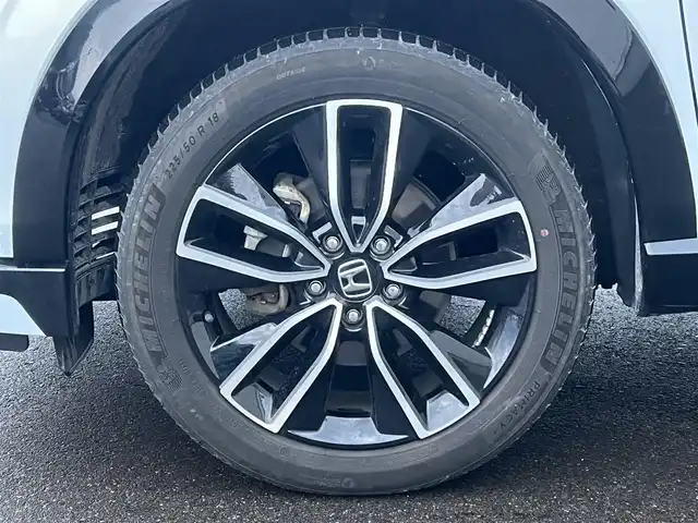 ホンダ ヴェゼル ハイブリッド e:HEV Z 秋田県 2023(令5)年 3.6万km プレミアムサンライトホワイトパール ４WD/衝突軽減システム/LEDヘッドライト/純正メモリナビ（DVD/CD/BT/AM/FM/USB）/フルセグ（走行中視聴可能）/バックカメラ/ホンダ純正１８インチアルミ（夏タイヤ装着）/スマートキー/アイドリングストップ/プッシュスタート/コーナーセンサー/レーンキープアシスト/クルーズコントロール追従走行あり/オートマチックハイビーム/ダウンヒルアシストコントロール/ステアリングスイッチ/ステアリングヒーター/パドルシフト/前席シートヒーター/ビルトインETC/電動リアゲート/電動パーキングブレーキ/オートブレーキホールド機能/純正フロアマット/社外ドアバイザー/オートライト/オートエアコン/パワーステアリング/パワーウィンドウ/横滑り防止/盗難防止装置/寒冷地仕様/電動格納ウィンカーミラー/保証書/取扱説明書/記録簿