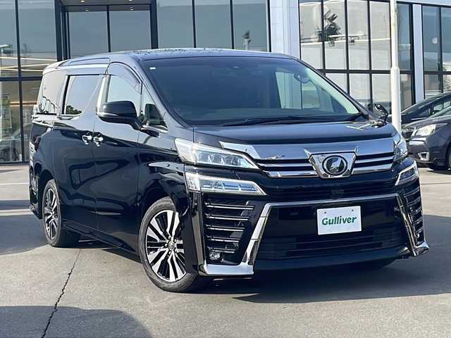 トヨタ ヴェルファイア Z Gエディション 青森県 2019(令1)年 6.7万km ブラック ・4WD/・本革シート/・純正SDナビ（アルパイン）/・フルセグ/・CD/DVD/SD/Bluetooth/・バックカメラ/・プッシュスタート/・スマートキー/・衝突被害軽減ブレーキ/・レーダークルーズコントロール/・レーンキープアシスト/・パワーバックドア/・コーナーセンサー/・横滑り防止/・LEDヘッドライト/・オートライト/・オートマチックハイビーム/・全席パワーシート/・前席エアシート/・シートメモリー/・オットマン/・ハンドルヒーター/・両側パワースライドドア/・純正ビルドインETC2.0/・純正ドライブレコーダー/・純正フロアマット/・純正ドアバイザー/・純正18AW/・保証書/・取扱説明書