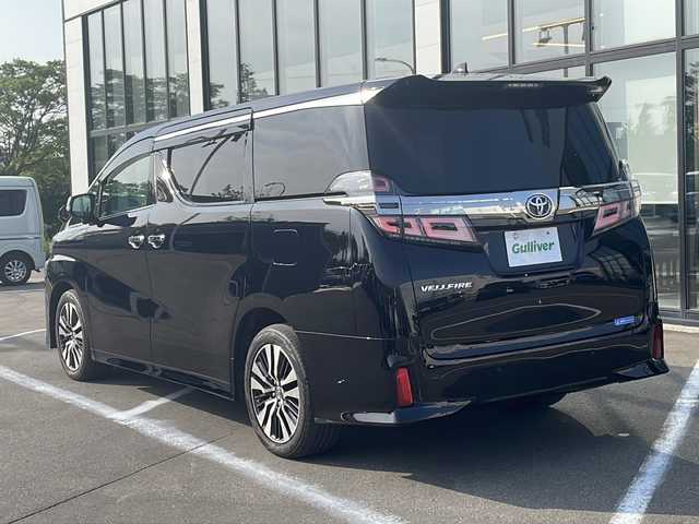 トヨタ ヴェルファイア Z Gエディション 青森県 2019(令1)年 6.7万km ブラック ・4WD/・本革シート/・純正SDナビ（アルパイン）/・フルセグ/・CD/DVD/SD/Bluetooth/・バックカメラ/・プッシュスタート/・スマートキー/・衝突被害軽減ブレーキ/・レーダークルーズコントロール/・レーンキープアシスト/・パワーバックドア/・コーナーセンサー/・横滑り防止/・LEDヘッドライト/・オートライト/・オートマチックハイビーム/・全席パワーシート/・前席エアシート/・シートメモリー/・オットマン/・ハンドルヒーター/・両側パワースライドドア/・純正ビルドインETC2.0/・純正ドライブレコーダー/・純正フロアマット/・純正ドアバイザー/・純正18AW/・保証書/・取扱説明書