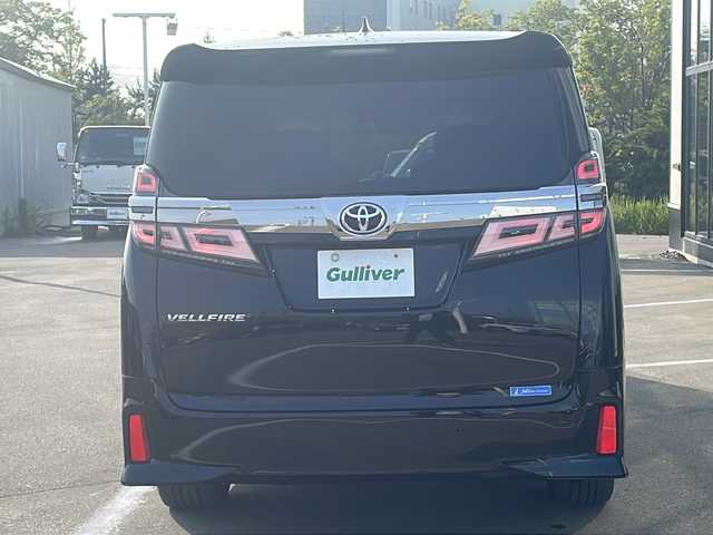 トヨタ ヴェルファイア Z Gエディション 青森県 2019(令1)年 6.7万km ブラック ・4WD/・本革シート/・純正SDナビ（アルパイン）/・フルセグ/・CD/DVD/SD/Bluetooth/・バックカメラ/・プッシュスタート/・スマートキー/・衝突被害軽減ブレーキ/・レーダークルーズコントロール/・レーンキープアシスト/・パワーバックドア/・コーナーセンサー/・横滑り防止/・LEDヘッドライト/・オートライト/・オートマチックハイビーム/・全席パワーシート/・前席エアシート/・シートメモリー/・オットマン/・ハンドルヒーター/・両側パワースライドドア/・純正ビルドインETC2.0/・純正ドライブレコーダー/・純正フロアマット/・純正ドアバイザー/・純正18AW/・保証書/・取扱説明書