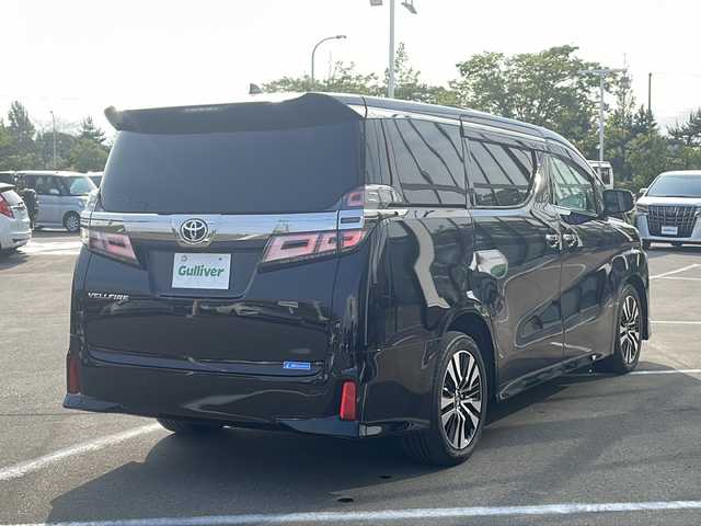 トヨタ ヴェルファイア Z Gエディション 青森県 2019(令1)年 6.7万km ブラック ・4WD/・本革シート/・純正SDナビ（アルパイン）/・フルセグ/・CD/DVD/SD/Bluetooth/・バックカメラ/・プッシュスタート/・スマートキー/・衝突被害軽減ブレーキ/・レーダークルーズコントロール/・レーンキープアシスト/・パワーバックドア/・コーナーセンサー/・横滑り防止/・LEDヘッドライト/・オートライト/・オートマチックハイビーム/・全席パワーシート/・前席エアシート/・シートメモリー/・オットマン/・ハンドルヒーター/・両側パワースライドドア/・純正ビルドインETC2.0/・純正ドライブレコーダー/・純正フロアマット/・純正ドアバイザー/・純正18AW/・保証書/・取扱説明書