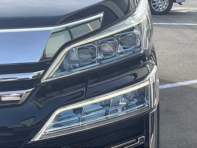 トヨタ ヴェルファイア Z Gエディション 青森県 2019(令1)年 6.7万km ブラック ・4WD/・本革シート/・純正SDナビ（アルパイン）/・フルセグ/・CD/DVD/SD/Bluetooth/・バックカメラ/・プッシュスタート/・スマートキー/・衝突被害軽減ブレーキ/・レーダークルーズコントロール/・レーンキープアシスト/・パワーバックドア/・コーナーセンサー/・横滑り防止/・LEDヘッドライト/・オートライト/・オートマチックハイビーム/・全席パワーシート/・前席エアシート/・シートメモリー/・オットマン/・ハンドルヒーター/・両側パワースライドドア/・純正ビルドインETC2.0/・純正ドライブレコーダー/・純正フロアマット/・純正ドアバイザー/・純正18AW/・保証書/・取扱説明書