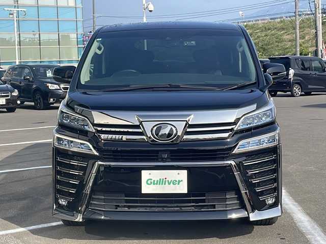 トヨタ ヴェルファイア Z Gエディション 青森県 2019(令1)年 6.7万km ブラック ・4WD/・本革シート/・純正SDナビ（アルパイン）/・フルセグ/・CD/DVD/SD/Bluetooth/・バックカメラ/・プッシュスタート/・スマートキー/・衝突被害軽減ブレーキ/・レーダークルーズコントロール/・レーンキープアシスト/・パワーバックドア/・コーナーセンサー/・横滑り防止/・LEDヘッドライト/・オートライト/・オートマチックハイビーム/・全席パワーシート/・前席エアシート/・シートメモリー/・オットマン/・ハンドルヒーター/・両側パワースライドドア/・純正ビルドインETC2.0/・純正ドライブレコーダー/・純正フロアマット/・純正ドアバイザー/・純正18AW/・保証書/・取扱説明書