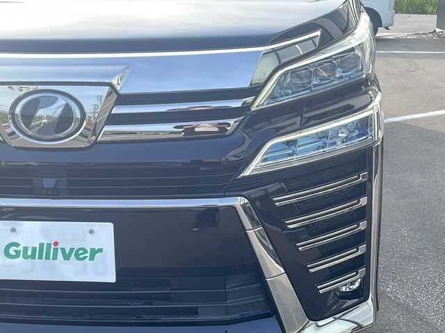 トヨタ ヴェルファイア Z Gエディション 青森県 2019(令1)年 6.7万km ブラック ・4WD/・本革シート/・純正SDナビ（アルパイン）/・フルセグ/・CD/DVD/SD/Bluetooth/・バックカメラ/・プッシュスタート/・スマートキー/・衝突被害軽減ブレーキ/・レーダークルーズコントロール/・レーンキープアシスト/・パワーバックドア/・コーナーセンサー/・横滑り防止/・LEDヘッドライト/・オートライト/・オートマチックハイビーム/・全席パワーシート/・前席エアシート/・シートメモリー/・オットマン/・ハンドルヒーター/・両側パワースライドドア/・純正ビルドインETC2.0/・純正ドライブレコーダー/・純正フロアマット/・純正ドアバイザー/・純正18AW/・保証書/・取扱説明書
