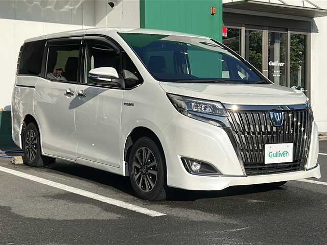 トヨタ エスクァイア ハイブリッド Gi プレミアムパッケージ ブラックテーラード 京都府 2019(令1)年 6.7万km パール バックカメラ　純正ドラレコ　純正１０インチナビ　フルセグテレビ　ＥＴＣ２．０　両側パワースライドドア　ＬＥＤヘッドライト　シートヒーター　ステアリングヒーター　クルーズコントロール