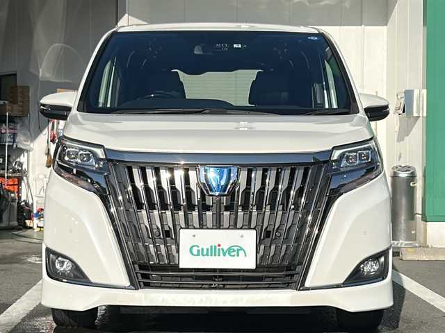 トヨタ エスクァイア ハイブリッド Gi プレミアムパッケージ ブラックテーラード 京都府 2019(令1)年 6.7万km パール バックカメラ　純正ドラレコ　純正１０インチナビ　フルセグテレビ　ＥＴＣ２．０　両側パワースライドドア　ＬＥＤヘッドライト　シートヒーター　ステアリングヒーター　クルーズコントロール