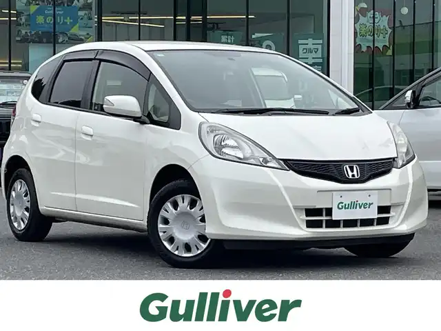 ホンダ フィット G 島根県 2013(平25)年 5.2万km プレミアムホワイトパール 社外ナビ/CD/DVD/DTV/Bluetooth/バックカメラ/リモコンキー /電動格納ミラー/純正フロアマット/ドアバイザー/ヘッドライトレベライザー