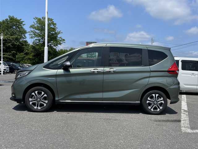 ホンダ フリード ハイブリット 青森県 2020(令2)年 7万km シルバーミストグリーンM 4WD/社外ナビ/フルセグTV/CD/DVD/BT/前後ドライブレコーダー/バックカメラ/ETC/シートヒーター/両側パワースライドドア/純正15インチAW/ホンダセンシング/LEDヘッドライト/スタッドレスタイヤ積込