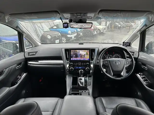 トヨタ アルファード SC 愛知県 2021(令3)年 1.9万km ブラック ワンオーナー/TRDエアロ（F・S・R）/デジタルインナーミラー/純正メーカーナビ/フルセグTV/BT/DVDデッキ/AC100V電源/JBLサウンド/パノラミックビューモニター/ビルトイン2.0ETC/純正18インチAW/トヨタセーフティセンス/レーダークルーズコントロール/ブラインドスポットモニター/前後ドライブレコーダー/両側パワースライドドア/パワーバックドア/レザーシート/前席パワーシート（D席めもりー付き）/前席シートヒーター/エアシート/オットマン/純正フロアマット/スペアタイヤ/取説、保証書/スペアキー