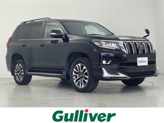 トヨタ ランドクルーザー プラド TX Lパッケージ 愛知県 2021(令3)年 3.3万km ブラック サンルーフ/モデリスタエアロ/社外ナビ（AVIC-RW711）/・フルセグTV/・CD/DVD/・Bluetooth接続/・USB入力/バックカメラ/レーダークルーズコントロール/本革シート/シートヒーター／シートベンチレーション/パワーシート/ビルトインＥＴＣ/ルーフレール/LEDオートライト・オートハイビーム/フォグランプ/センターデフロック/ダウンヒルアシスト/純正アルミホイール/純正フロアマット