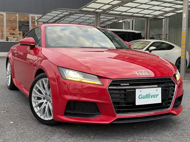 アウディ ＴＴクーペ 2．0 TFSI クワトロ 京都府 2015(平27)年 2.6万km ブリリアントレッド  4WDターボ/ Sラインパッケージ/ アシスタンスパッケージ/ ワンオーナー/ Sラインアルカンターラ/革コンビシート/・　前席パワーシート/ バーチャルコックピット12.3インチフル液晶メーター/・　MMIナビゲーション/・　フルセグ/CD/DVD/BTオーディオ/・　リヤビューカメラ/ 前後パーキングシステム/ クルーズコントロール/ パドルシフト/ 純正18インチアルミホイール/ スマートキー２個/ ETC2.0/ 横滑り防止機能/ LEDヘッドランプ/ 車両取説/ 新車時保証書