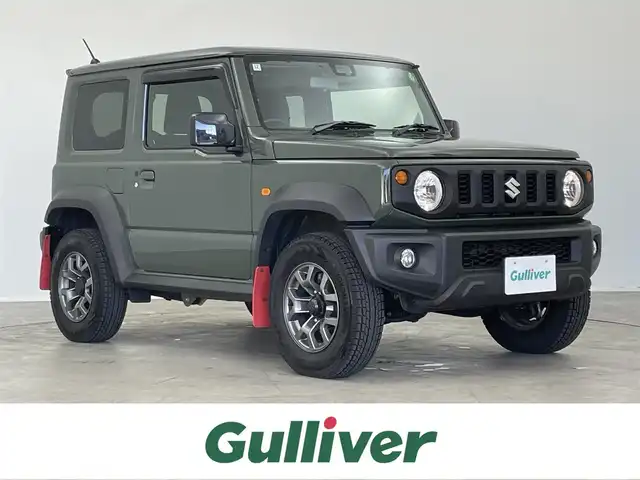 スズキ ジムニー シエラ JL 埼玉県 2024(令6)年 0.5万km ジャングルグリーン 4WD/純正8インチディスプレイオーディオ/ 地デジTV Bluetooth/スズキデュアルブレーキシステム/レーンキープアシスト/クリアランスソナー /シートヒーター/純正マッドフラップ/純正シートカバー/純正ノーマルタイヤ/ビルトインETC/スマートキー