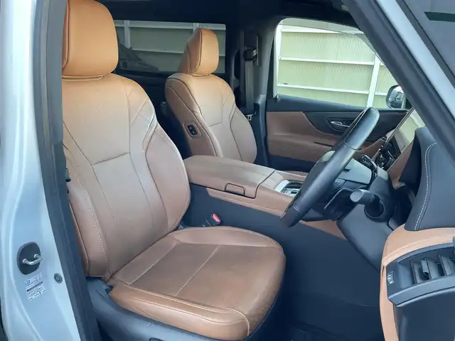 トヨタ ヴェルファイア ハイブリット Z プレミア 東京都 2023(令5)年 2.1万km プラチナホワイトパールマイカ ワンオーナー　/純正14型ディスプレィオーディオ/・BluetoothAudio/・AppleCarPlay/AndroidAuto/ムーンルーフ /ブラウンレザーシート/アラウンドビューモニター /パーキングサポートブレーキ/ブラインドスポットモニター /両側パワースライドドア /パワーバックドア /クリアランスソナー /アドバンストパーク/レーンチェンジアシスト/デジタルインナーミラー/スマホ置くだけ充電/パワーオットマンシート/保証書＆取説/スペアキーX1/ビルトインETC