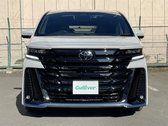 トヨタ ヴェルファイア ハイブリット Z プレミア 東京都 2023(令5)年 2.1万km プラチナホワイトパールマイカ ワンオーナー　/純正14型ディスプレィオーディオ/・BluetoothAudio/・AppleCarPlay/AndroidAuto/ムーンルーフ /ブラウンレザーシート/アラウンドビューモニター /パーキングサポートブレーキ/ブラインドスポットモニター /両側パワースライドドア /パワーバックドア /クリアランスソナー /アドバンストパーク/レーンチェンジアシスト/デジタルインナーミラー/スマホ置くだけ充電/パワーオットマンシート/保証書＆取説/スペアキーX1/ビルトインETC