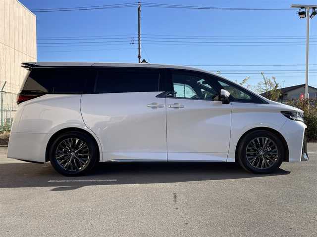トヨタ ヴェルファイア ハイブリット Z プレミア 東京都 2023(令5)年 2.1万km プラチナホワイトパールマイカ ワンオーナー　/純正14型ディスプレィオーディオ/・BluetoothAudio/・AppleCarPlay/AndroidAuto/ムーンルーフ /ブラウンレザーシート/アラウンドビューモニター /パーキングサポートブレーキ/ブラインドスポットモニター /両側パワースライドドア /パワーバックドア /クリアランスソナー /アドバンストパーク/レーンチェンジアシスト/デジタルインナーミラー/スマホ置くだけ充電/パワーオットマンシート/保証書＆取説/スペアキーX1/ビルトインETC