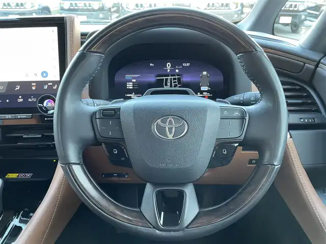 トヨタ ヴェルファイア ハイブリット Z プレミア 東京都 2023(令5)年 2.1万km プラチナホワイトパールマイカ ワンオーナー　/純正14型ディスプレィオーディオ/・BluetoothAudio/・AppleCarPlay/AndroidAuto/ムーンルーフ /ブラウンレザーシート/アラウンドビューモニター /パーキングサポートブレーキ/ブラインドスポットモニター /両側パワースライドドア /パワーバックドア /クリアランスソナー /アドバンストパーク/レーンチェンジアシスト/デジタルインナーミラー/スマホ置くだけ充電/パワーオットマンシート/保証書＆取説/スペアキーX1/ビルトインETC