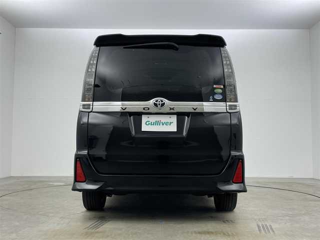 トヨタ ヴォクシー ZS 岡山県 2014(平26)年 6.2万km ブラック ９インチナビ　/（CD/DVD/BT/フルセグ）/型式：X900/１０．２インチフリップダウンモニター　/型式：TMX－R3000/両側電動スライド　/ビルトインＥＴＣ　/純正ＬＥＤヘッドライト　/フォグランプ/バックカメラ　/ドライブレコーダー（前）　 /USB接続 /スマートキー/アイドリングストップ/ミュージックサーバー/純正フロアマット/純正アルミホイール