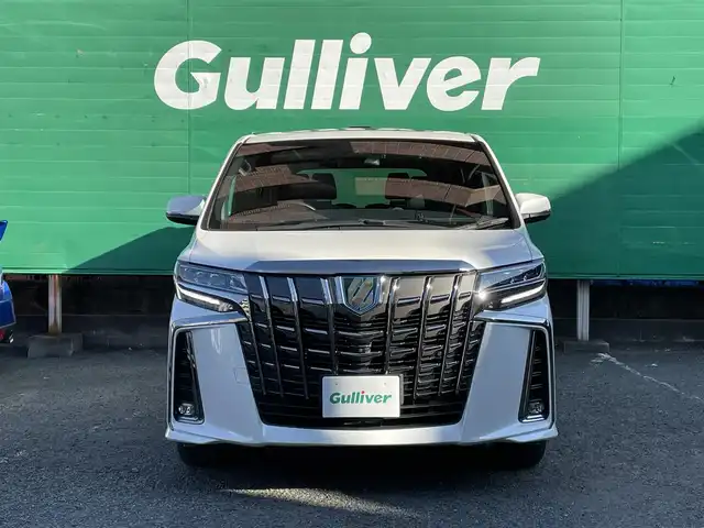 トヨタ アルファードハイブリット S タイプゴールドⅡ 東京都 2021(令3)年 1.7万km ホワイトパールクリスタルシャイン ワンオーナー/純正ナビ/・フルセグTV/Bluetooth/DVD/Tコネクト/JBLプレミアムサウンド/ツインムーンルーフ/フリップダウンモニター/デジタルインナーミラー/パノラミックビューモニター/両側電動スライドドア/電動リアゲート/純正ドライブレコーダー（DRD-H68)/セーフティセンス/レーダークルーズコントロール/レーンキープアシスト/衝突軽減システム/前後コーナーセンサー/LEDライト/フロントフォグランプ/オートハイビーム/オットマン/スペアキー×1/ETC2.0/保証書/取扱説明書/記録簿