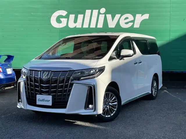 トヨタ アルファードハイブリット S タイプゴールドⅡ 東京都 2021(令3)年 1.7万km ホワイトパールクリスタルシャイン ワンオーナー/純正ナビ/・フルセグTV/Bluetooth/DVD/Tコネクト/JBLプレミアムサウンド/ツインムーンルーフ/フリップダウンモニター/デジタルインナーミラー/パノラミックビューモニター/両側電動スライドドア/電動リアゲート/純正ドライブレコーダー（DRD-H68)/セーフティセンス/レーダークルーズコントロール/レーンキープアシスト/衝突軽減システム/前後コーナーセンサー/LEDライト/フロントフォグランプ/オートハイビーム/オットマン/スペアキー×1/ETC2.0/保証書/取扱説明書/記録簿